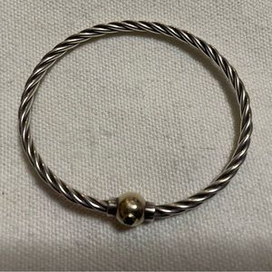 Authentic Cape Cod bracelet with blue sapphire on the ball.